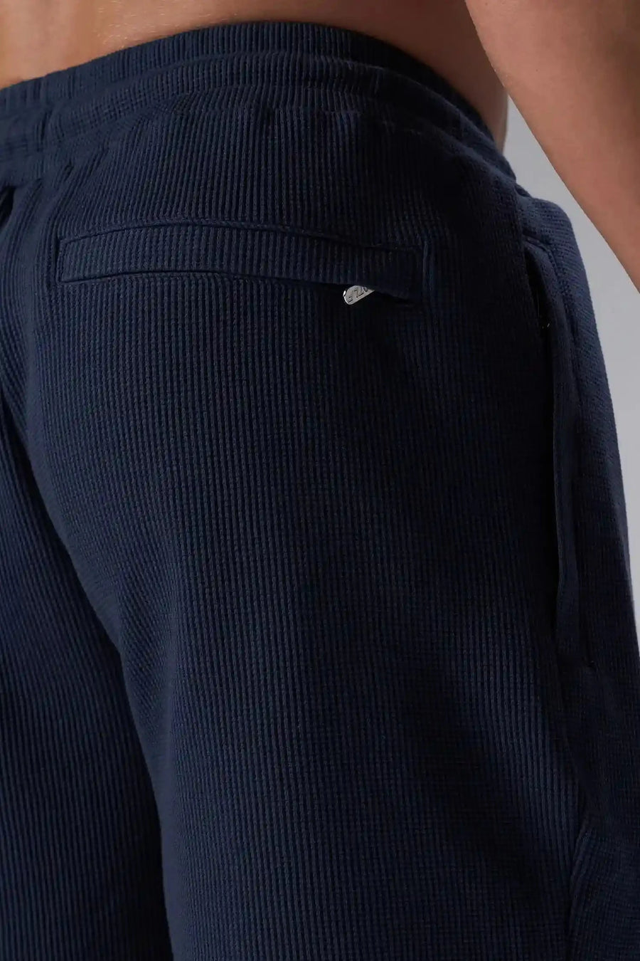 Front View of Blue TLF GTS Waffle Tech Shorts, featuring a 7 Inch inseam, an athletic relaxed fit with zipper pockets designed for all day wear