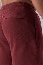 Front View of Red TLF GTS Waffle Tech Shorts, featuring a 7 Inch inseam, an athletic relaxed fit with zipper pockets designed for all day wear