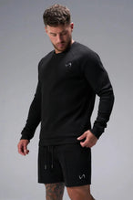 Front View of Black TLF GTS Waffle Tech Shorts, featuring a 7 Inch inseam, an athletic relaxed fit with zipper pockets designed for all day wear