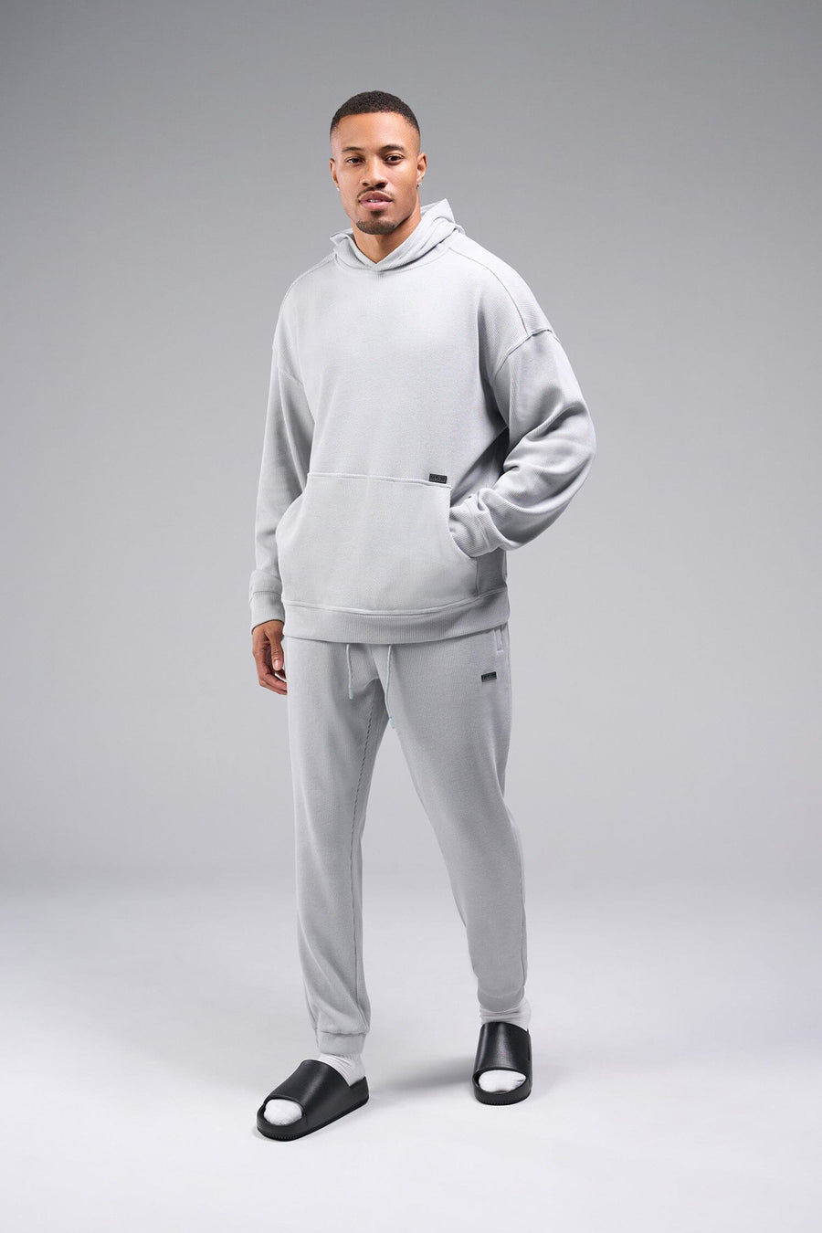 Front View of Gray TLF GTS Waffle Tech Hoodie, featuring kangaroo pockets, and double panel hoodie designed for all day wear