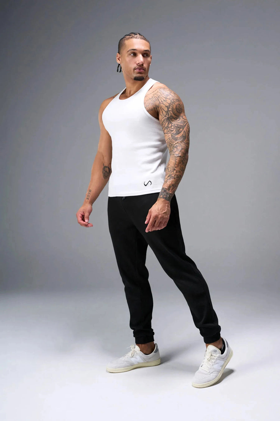 Front View of Black TLF GTS Waffle Tech Joggers, featuring an athletic relaxed fit with zipper pockets designed for all day wear