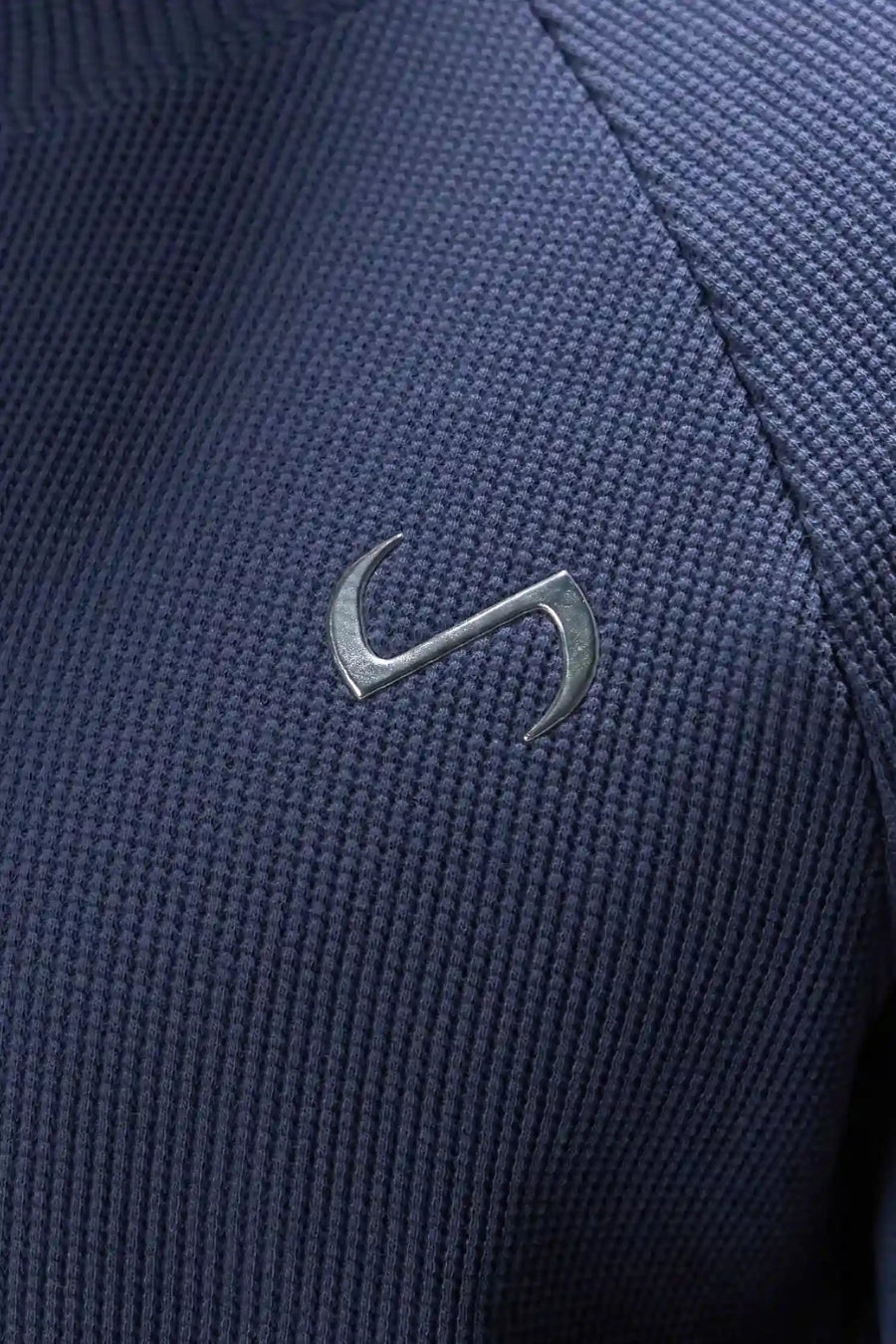 Detail View of Blue the TLF Waffle Tech Crew Neck featuring a raglan sleeve in our premium waffle knit fabric