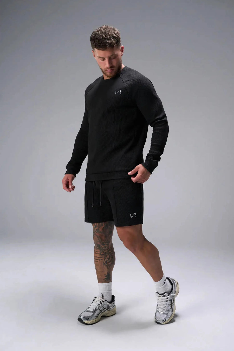 Front View of Black the TLF Waffle Tech Crew Neck featuring a raglan sleeve in our premium waffle knit fabric