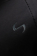 Detail View of Black the TLF Waffle Tech Crew Neck featuring a raglan sleeve in our premium waffle knit fabric