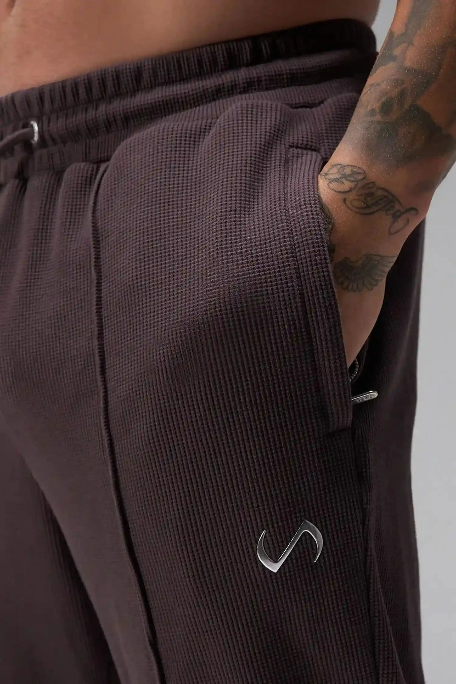 Front View of Brown the TLF GTS Waffle Tech Straight Leg Pants featuring pintuck detailing, zippered pockets and straight leg design