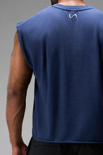 Back View of Blue the TLF Icon Muscle Tank featuring our physique enhancing design, straight hem and relaxed fit. 