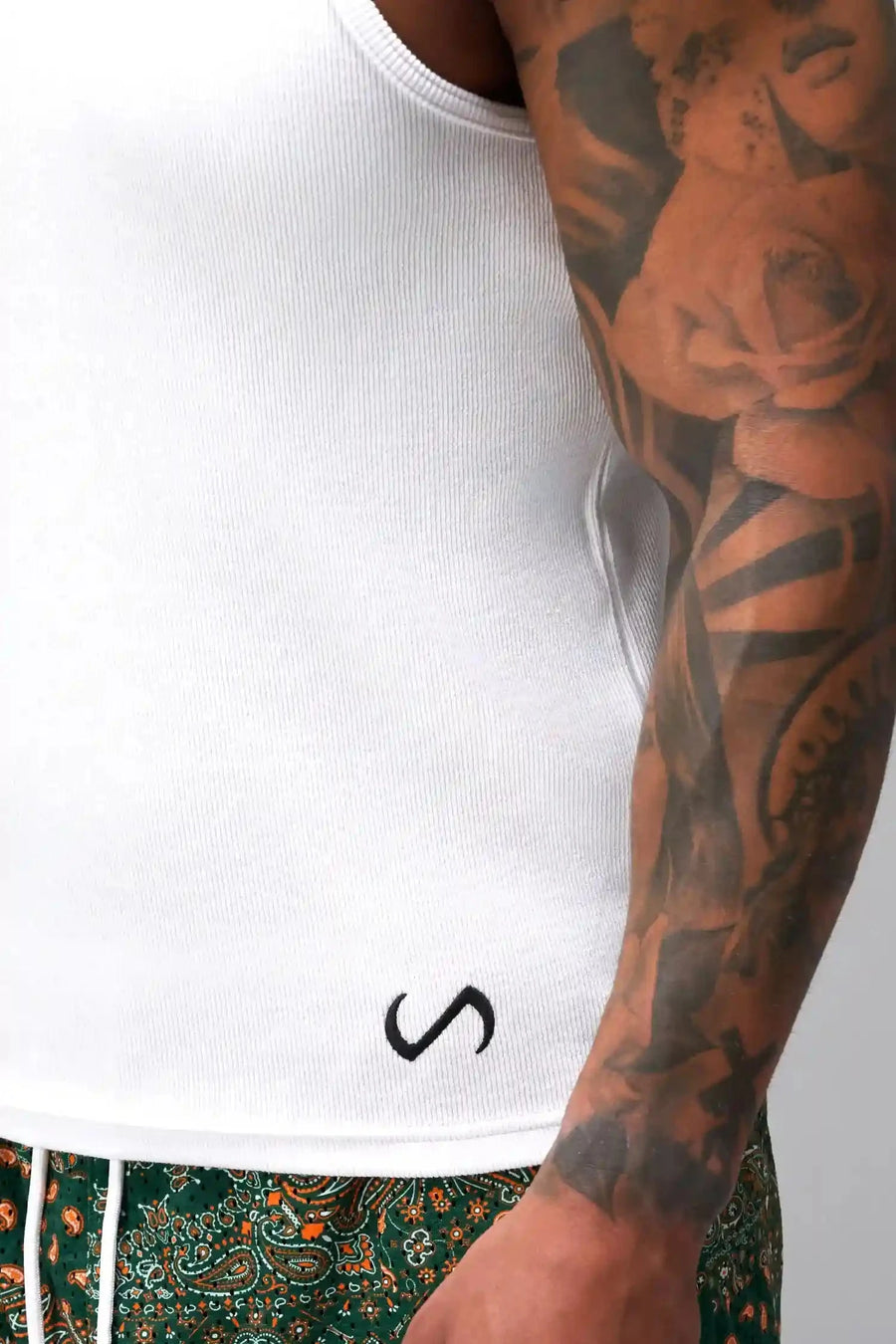 Front View of White Icon Ribbed Straight Hem Tank featuring our physique enhancing design, straight hem and relaxed fit