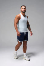 Front View of Light Blue Icon Ribbed Straight Hem Tank featuring our physique enhancing design, straight hem and relaxed fit