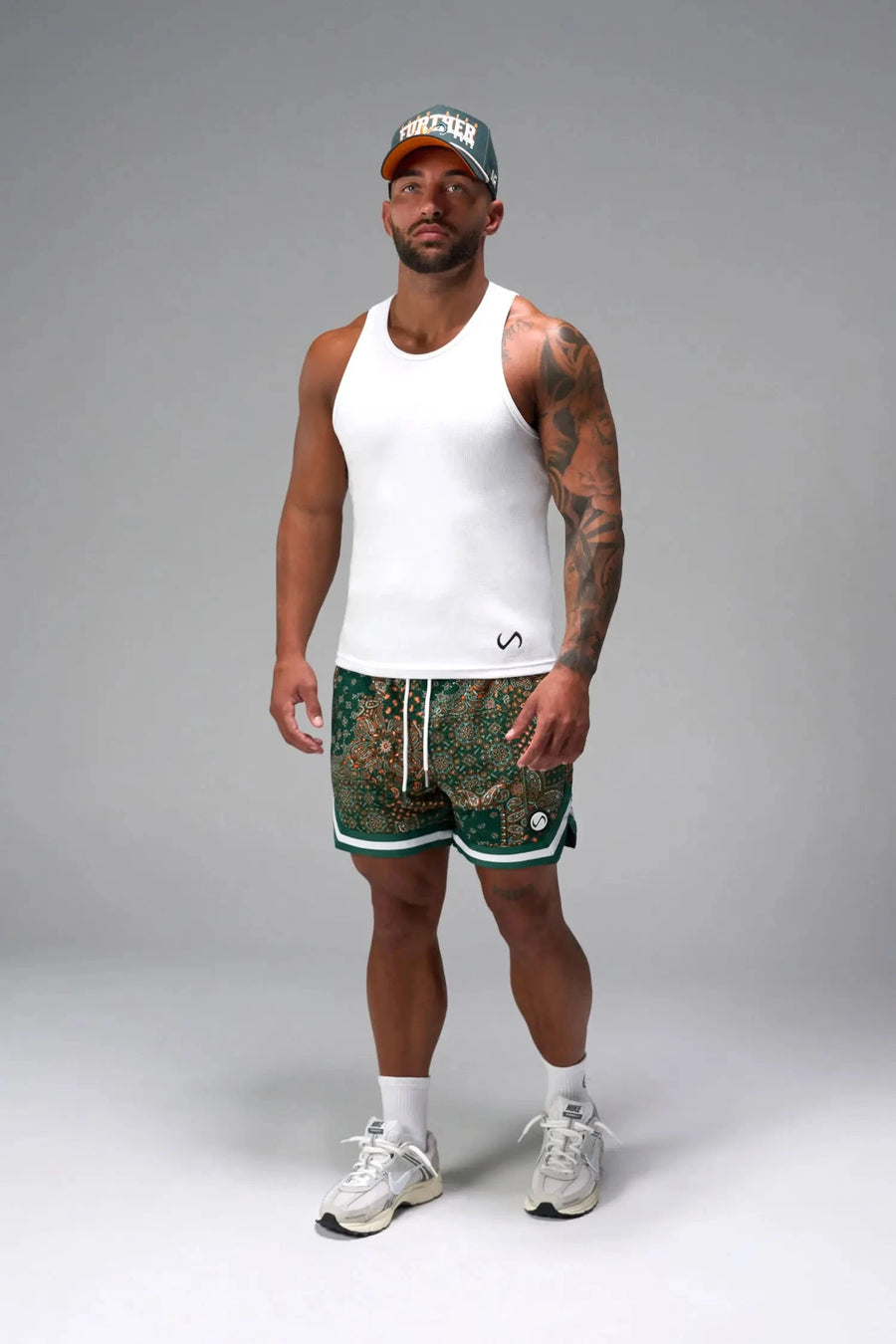 Front View of White Icon Ribbed Straight Hem Tank featuring our physique enhancing design, straight hem and relaxed fit