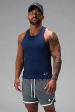 Front View of Blue Icon Ribbed Straight Hem Tank featuring our physique enhancing design, straight hem and relaxed fit