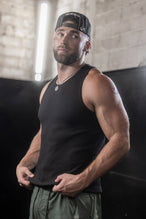 Front View of Black Icon Ribbed Straight Hem Tank featuring our physique enhancing design, straight hem and relaxed fit