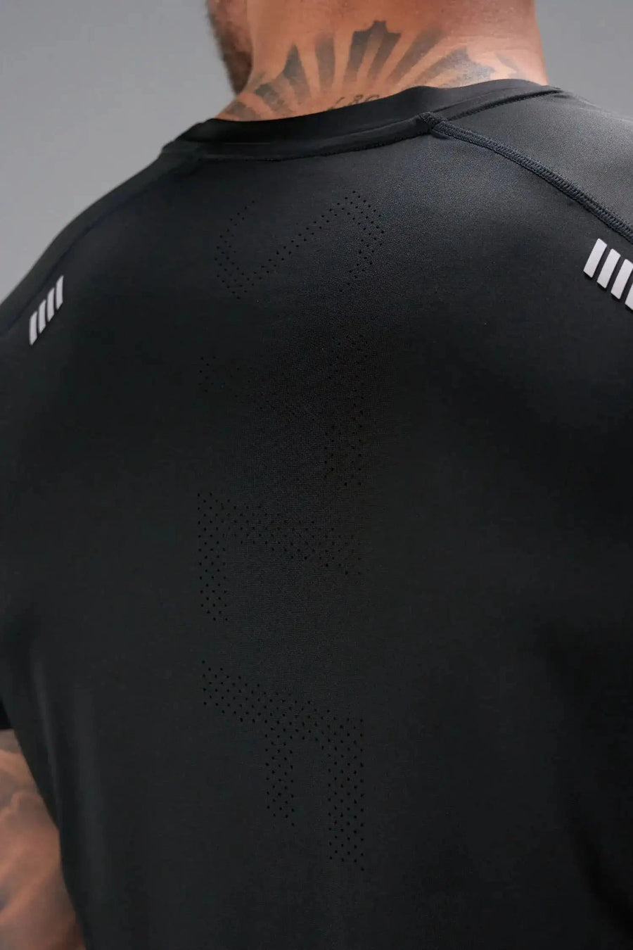 Back View of Black the TLF Infi Cool Lightweight Cooling Shirt engineered with cooling fabric technology, raglan sleeves and laser cut perforations. 