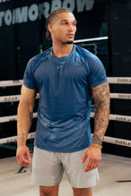 Front View of Blue the TLF Infi Cool Lightweight Cooling Shirt engineered with cooling fabric technology, raglan sleeves and laser cut perforations. 