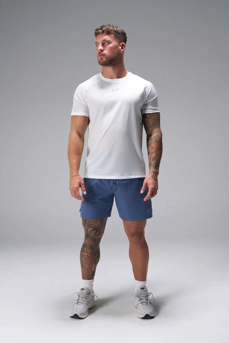 Front View of White the TLF Infi Cool Lightweight Cooling Shirt engineered with cooling fabric technology, raglan sleeves and laser cut perforations