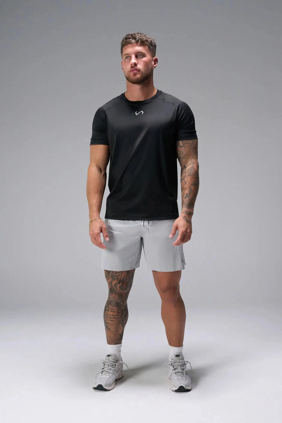 Front View of Black the TLF Infi Cool Lightweight Cooling Shirt engineered with cooling fabric technology, raglan sleeves and laser cut perforations. 