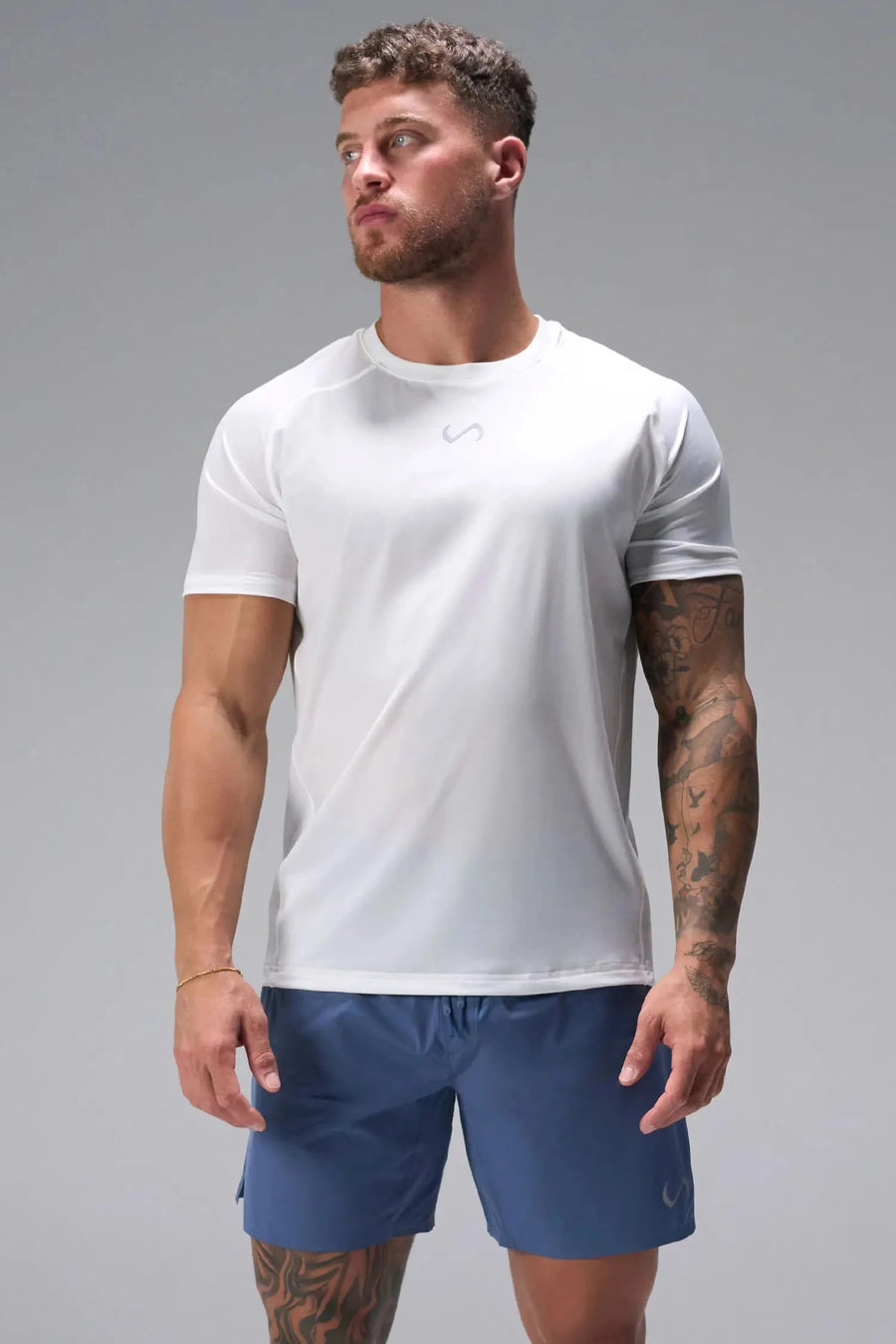 Front View of White the TLF Infi Cool Lightweight Cooling Shirt engineered with cooling fabric technology, raglan sleeves and laser cut perforations