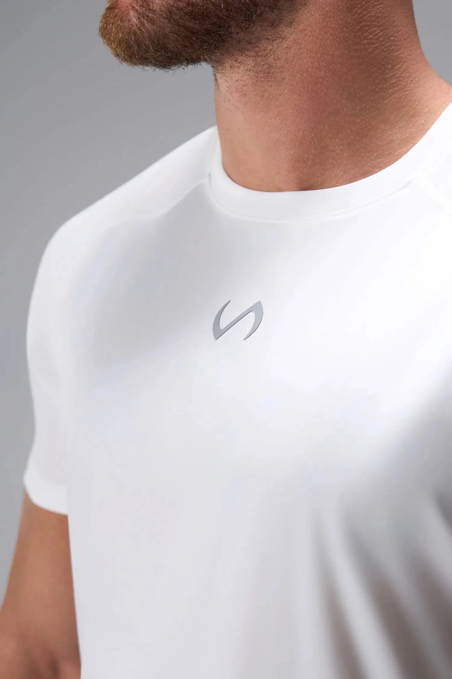 Front View of White the TLF Infi Cool Lightweight Cooling Shirt engineered with cooling fabric technology, raglan sleeves and laser cut perforations
