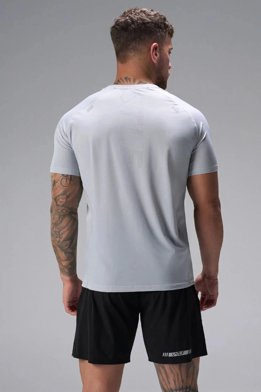 Back View of Gray the TLF Infi Cool Lightweight Cooling Shirt engineered with cooling fabric technology, raglan sleeves and laser cut perforations. 