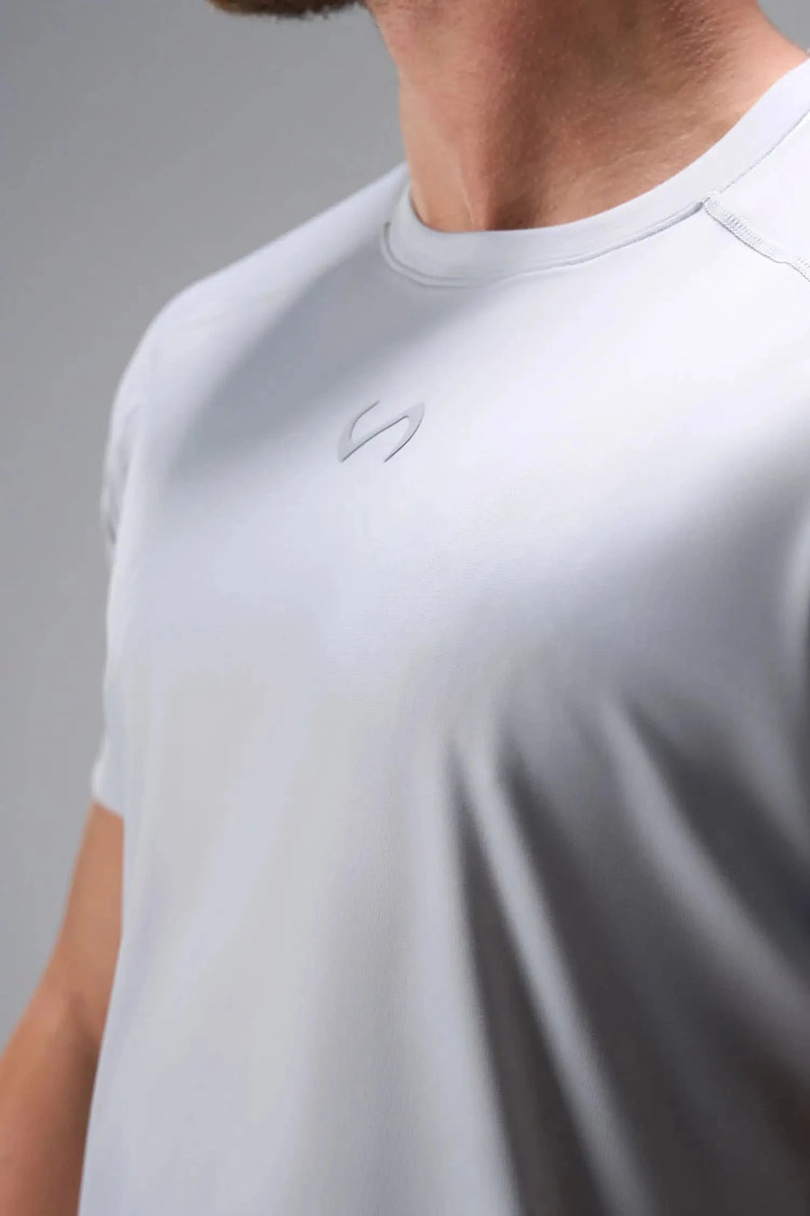 Front View of Gray the TLF Infi Cool Lightweight Cooling Shirt engineered with cooling fabric technology, raglan sleeves and laser cut perforations. 