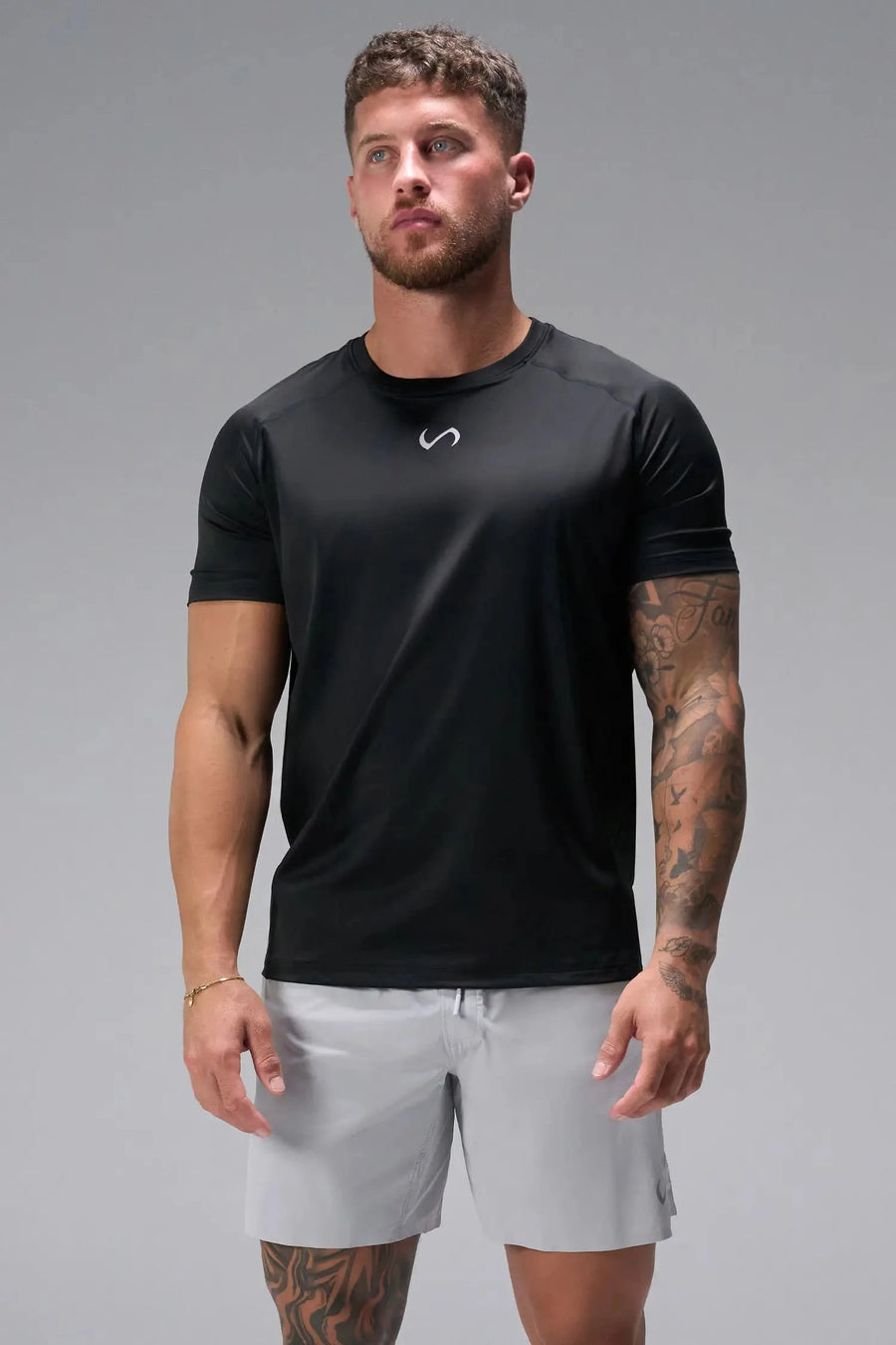 Front View of Black the TLF Infi Cool Lightweight Cooling Shirt engineered with cooling fabric technology, raglan sleeves and laser cut perforations. 