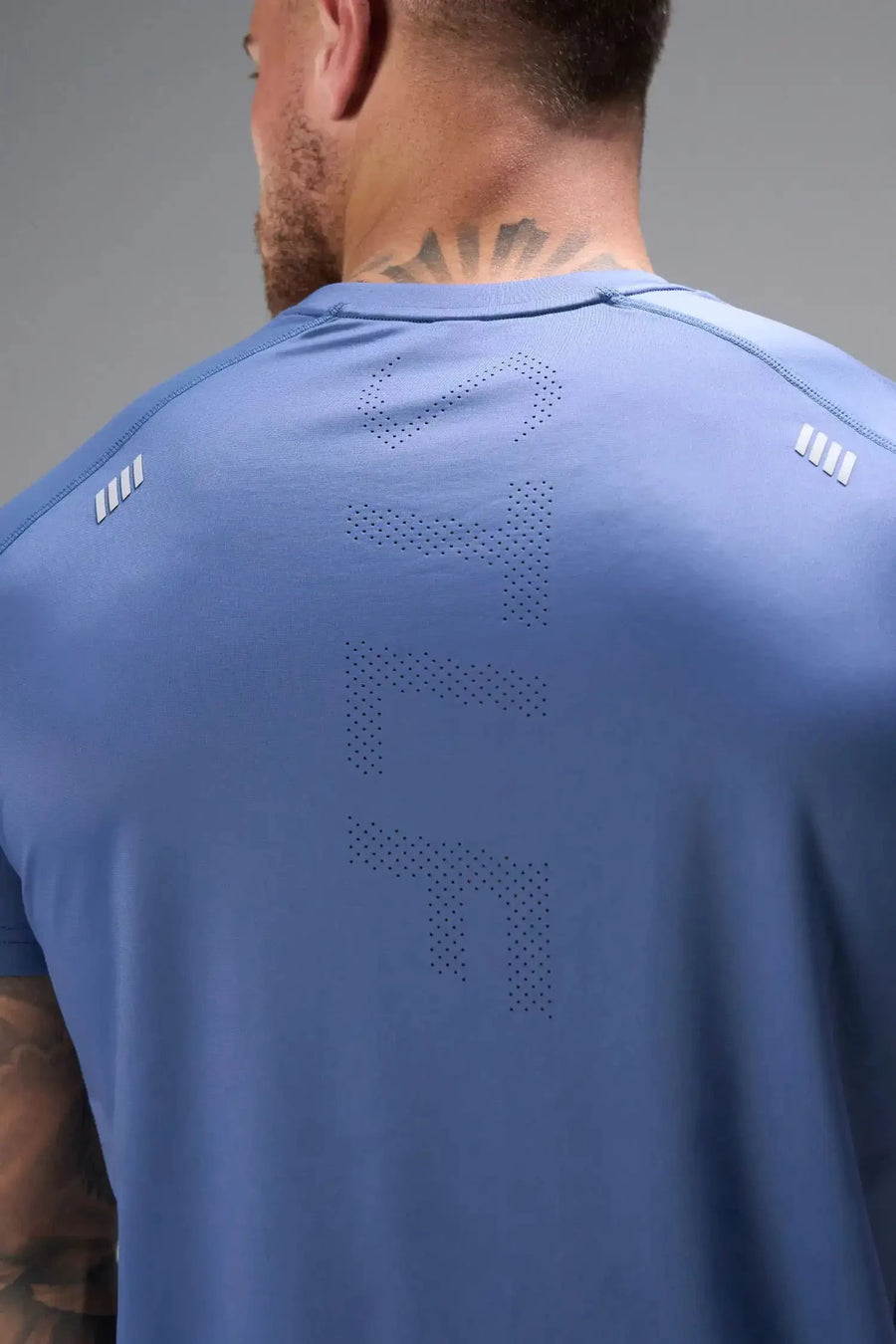 Back View of Gray the TLF Infi Cool Lightweight Cooling Shirt engineered with cooling fabric technology, raglan sleeves and laser cut perforations. 