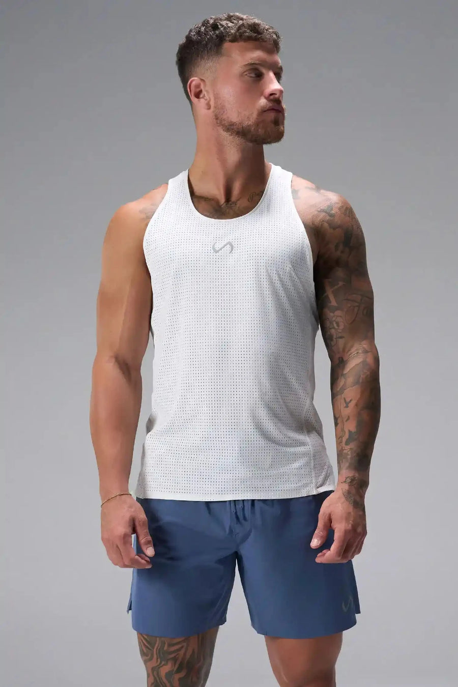 Front View of White the TLF Infi Cool workout tank engineered with infi cool DNA cooling fabric technology, laser cut mesh holes and perforations