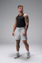 Front View of Black the TLF Infi Cool workout tank engineered with infi cool DNA cooling fabric technology, laser cut mesh holes and perforations
