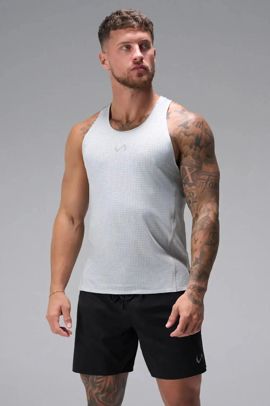 Front View of Gray the TLF Infi Cool workout tank engineered with infi cool DNA cooling fabric technology, laser cut mesh holes and perforations
