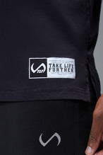 Front View of Black TLF Lifting Crew Cotton Luxe Oversized Tee featuring a 2-tone graphic print design across the chest.  