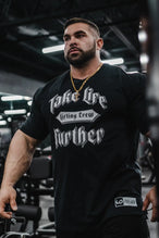 Front View of Black TLF Lifting Crew Cotton Luxe Oversized Tee featuring a 2-tone graphic print design across the chest.  