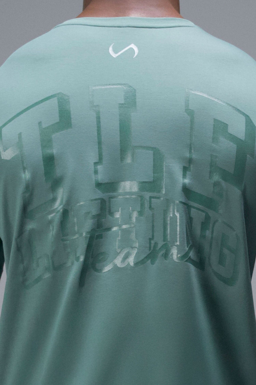 Back View of Green TLF Lifting Team Cotton Luxe Swole Tee, a gym shirt with a physique enhancing fit and a tonal graphic print 