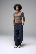Front View of Blue the TLF Low Rise Oversized Cargo Joggers featuring a low-rise waistline, oversized & baggy fit and snap button cargo pockets