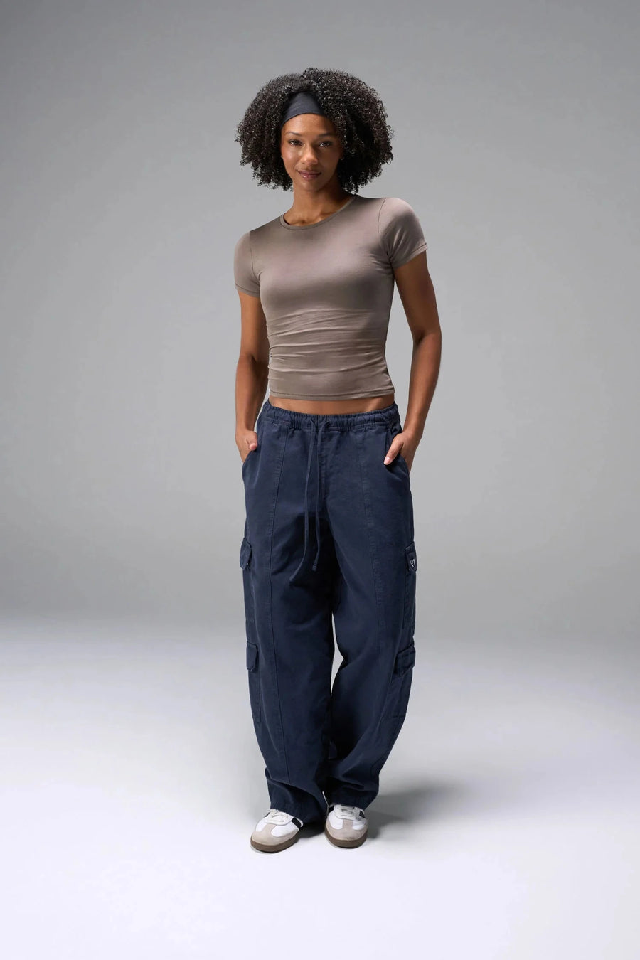 Front View of Blue the TLF Low Rise Oversized Cargo Joggers featuring a low-rise waistline, oversized & baggy fit and snap button cargo pockets