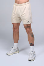 Front View of Oat Milk TLF Micro Mesh 6.5 Inch Shorts, featuring zippered pockets, 6.5” inch inseam and adjustable waistband