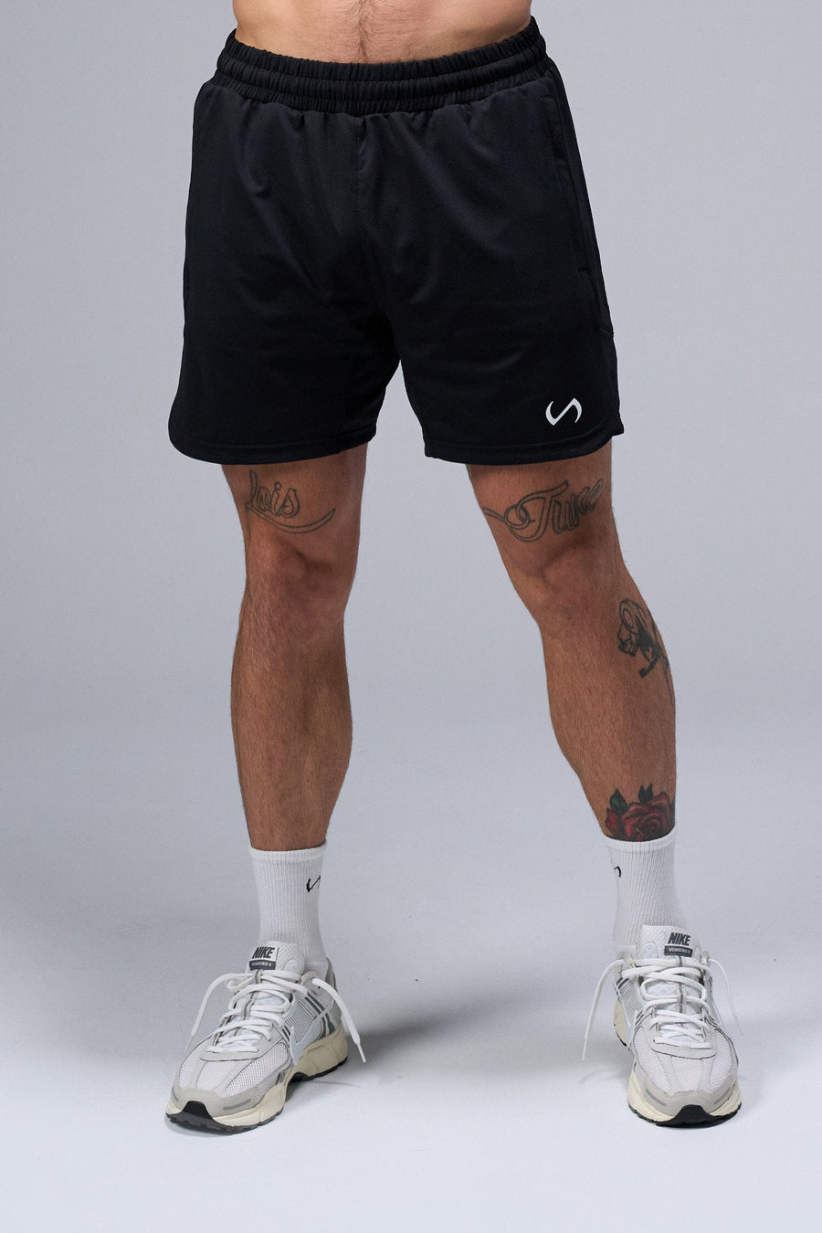 Front View of Black TLF Micro Mesh 6.5 Inch Shorts, featuring zippered pockets, 6.5” inch inseam and adjustable waistband
