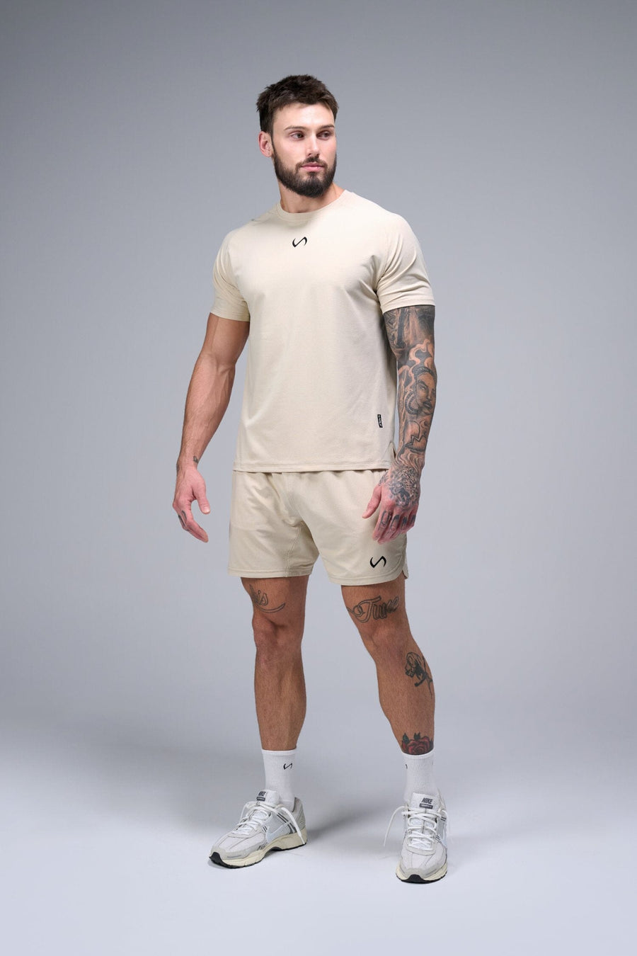 Front View of Oat Milk TLF Micro Mesh 6.5 Inch Shorts, featuring zippered pockets, 6.5” inch inseam and adjustable waistband