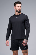 Front View of Black TLF Micro Mesh Long Sleeve Shirt, featuring raglan sleeves in Micro Mesh Fabric for breathability and performance