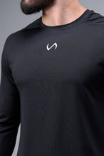 Detail Front View of Black TLF Micro Mesh Long Sleeve Shirt, featuring raglan sleeves in Micro Mesh Fabric for breathability and performance