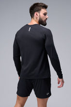 Back View of Black TLF Micro Mesh Long Sleeve Shirt, featuring raglan sleeves in Micro Mesh Fabric for breathability and performance