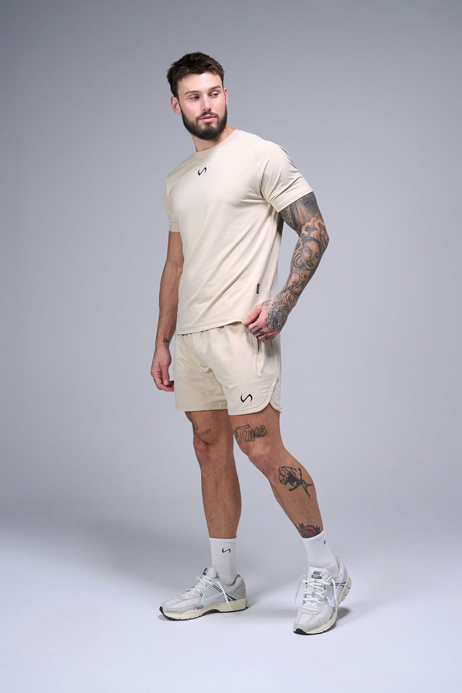 Front View of Oat Milk TLF Micro Mesh Tee, featuring raglan sleeves in performance Micro Mesh Fabric for breathability