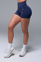 Front View of Blue TLF NeoCloud™ 4 Inch Secret Glute Seam Shorts featuring our new secret glute seam technology to lift and shape your glutes.