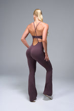 Back View of Brown TLF NeoCloud™ Flare Jumpsuit featuring a built-in low support sports bra with removable pads and adjustable straps