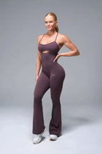 Front View of Brown TLF NeoCloud™ Flare Jumpsuit featuring a built-in low support sports bra with removable pads and adjustable straps