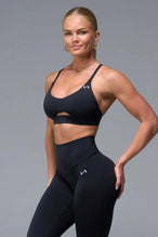 Front View of Black TLF NeoCloud™ Keyhole Sports Bra featuring a strappy back and keyhole front design with low to medium support