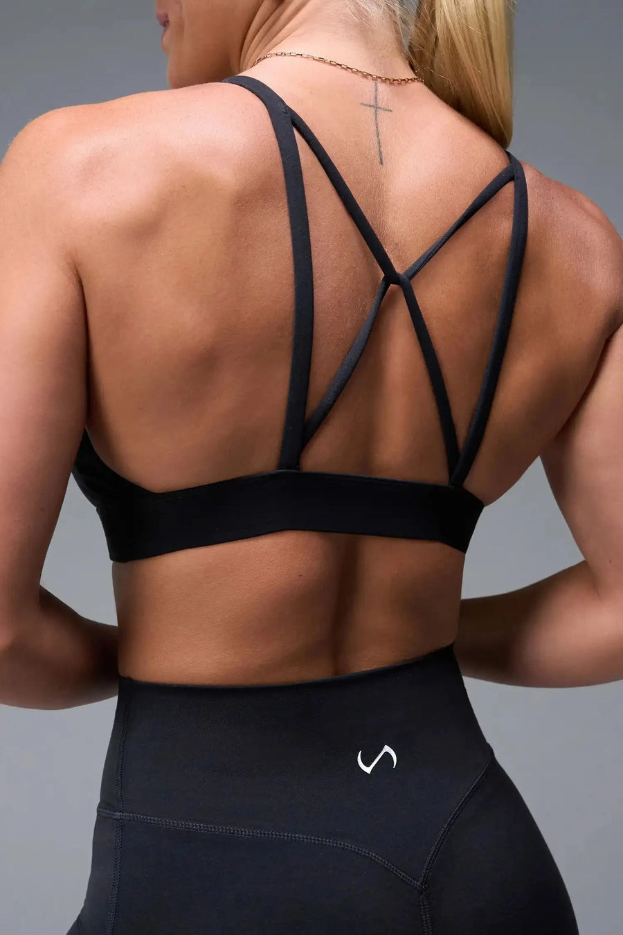 Back View of Black TLF NeoCloud™ Keyhole Sports Bra featuring a strappy back and keyhole front design with low to medium support