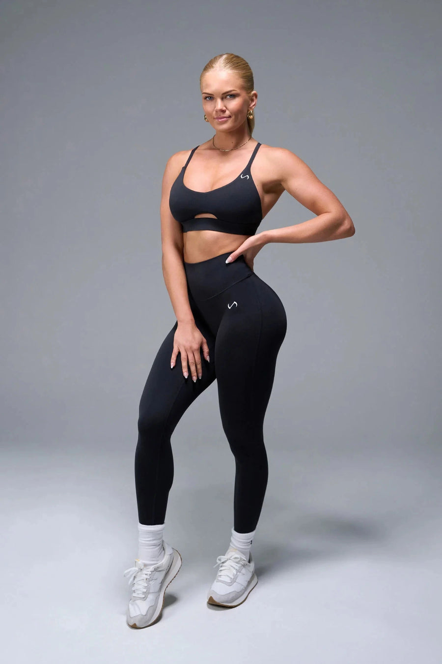 Front View of Black TLF NeoCloud™ Keyhole Sports Bra featuring a strappy back and keyhole front design with low to medium support