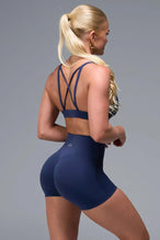 Back View of Blue TLF NeoCloud™ Keyhole Sports Bra featuring a strappy back and keyhole front design with low to medium support