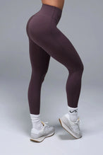 Side View of Brown TLF NeoCloud™ Secret Glute Seam Leggings featuring our new secret glute seam technology to lift and shape your glutes. 
