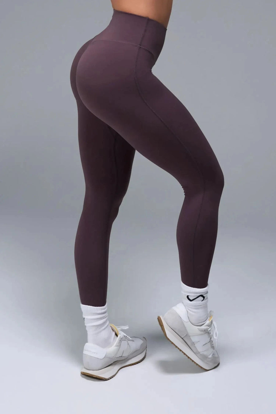 Side View of Brown TLF NeoCloud™ Secret Glute Seam Leggings featuring our new secret glute seam technology to lift and shape your glutes. 