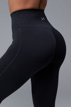 Back View of Black TLF NeoCloud™ Secret Glute Seam Leggings featuring our new secret glute seam technology to lift and shape your glutes. 